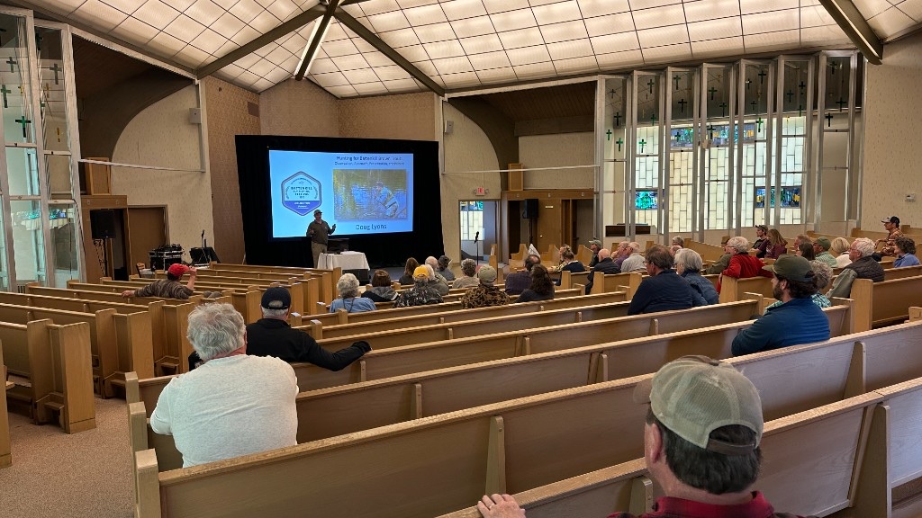 Doug Lyons presenting Hunting for Battenkill Brown Trout on the big screen.