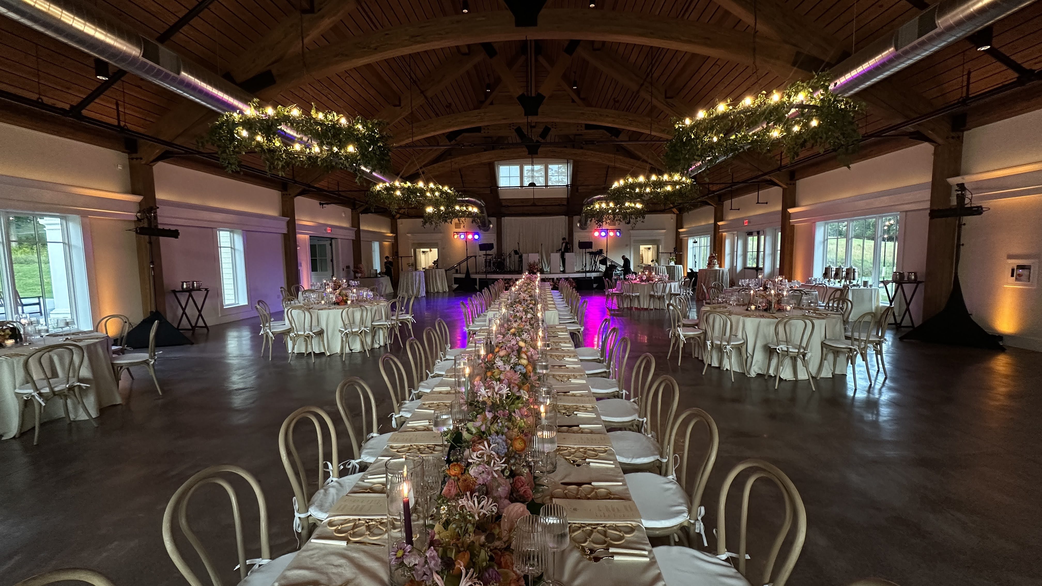 Reception at Hildene's Lincoln Hall with atmospheric uplighting and band lighting.