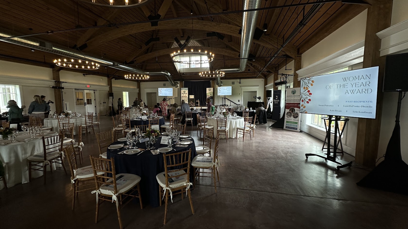 Women in Leadership Luncheon 2026 — keynote speakers at the podium, Lincoln Hall at Hildene.